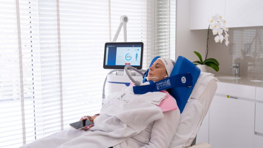 A woman getting a treatment for nin surgical contours