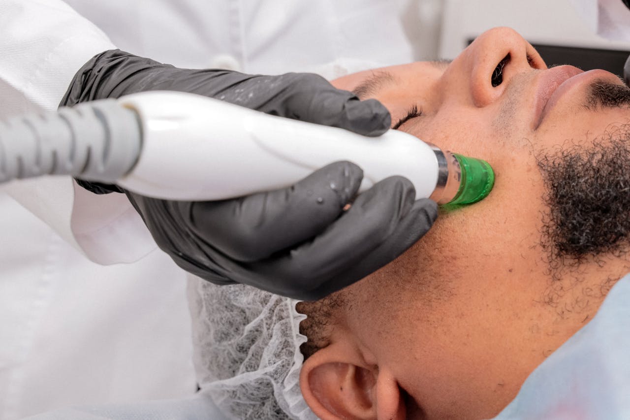 Man getting facial treatment