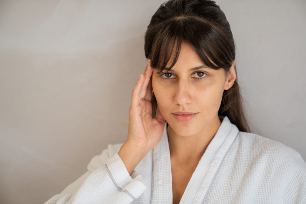 A woman getting enhancements at Lucia Clinic