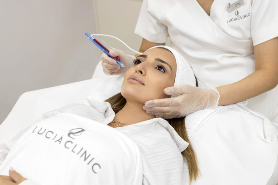 A woman at her first JetPeel treatment at Lucia Clinic