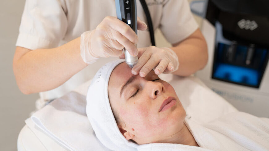 A woman getting EMFUSION treatment
