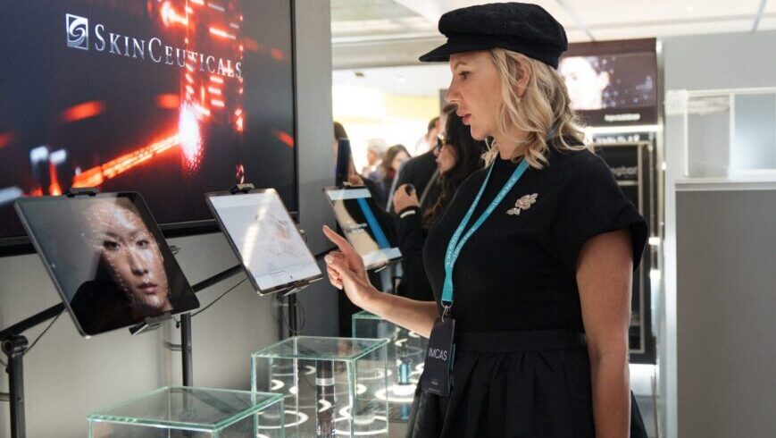 Dr. Radmila at the SkinCeuticals booth about P-TIOX serum