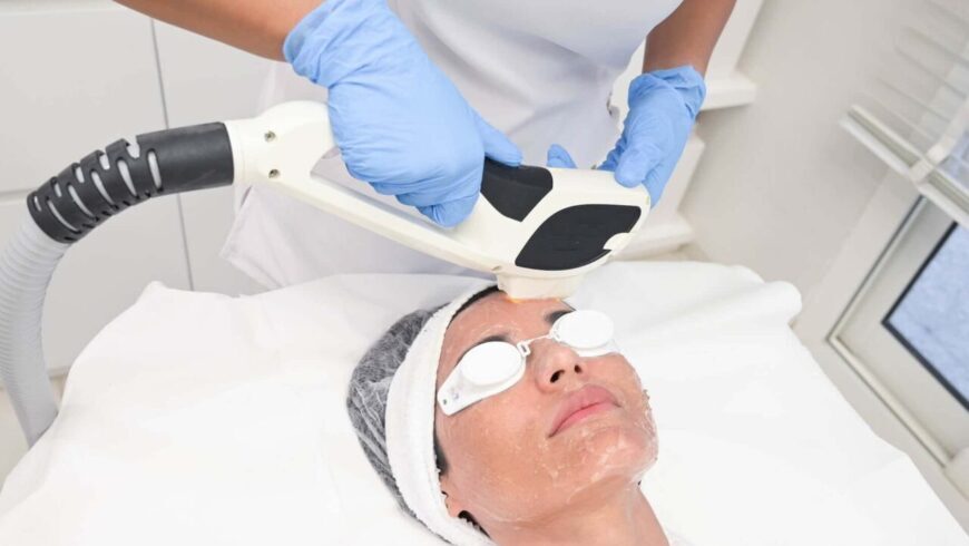 A woman getting a rosacea treatment