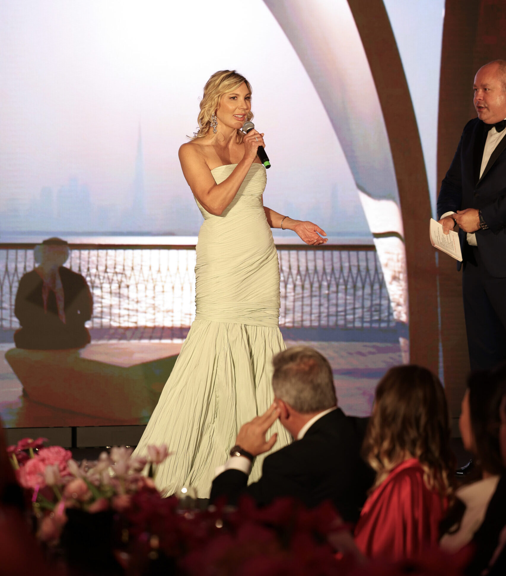 Dr. Radmila Lukian taking stage at the Global Gift Gala Paris 2026